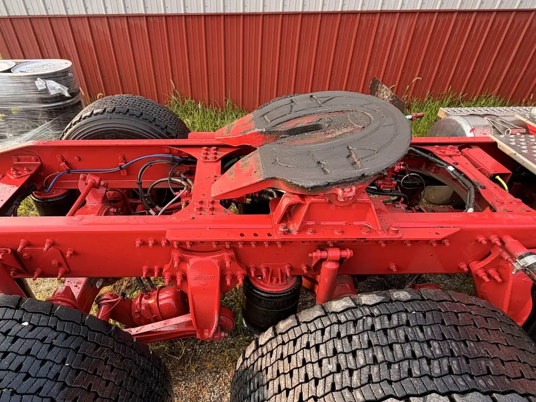 Peterbilt frame and fifth wheel freshly degreased and painted red