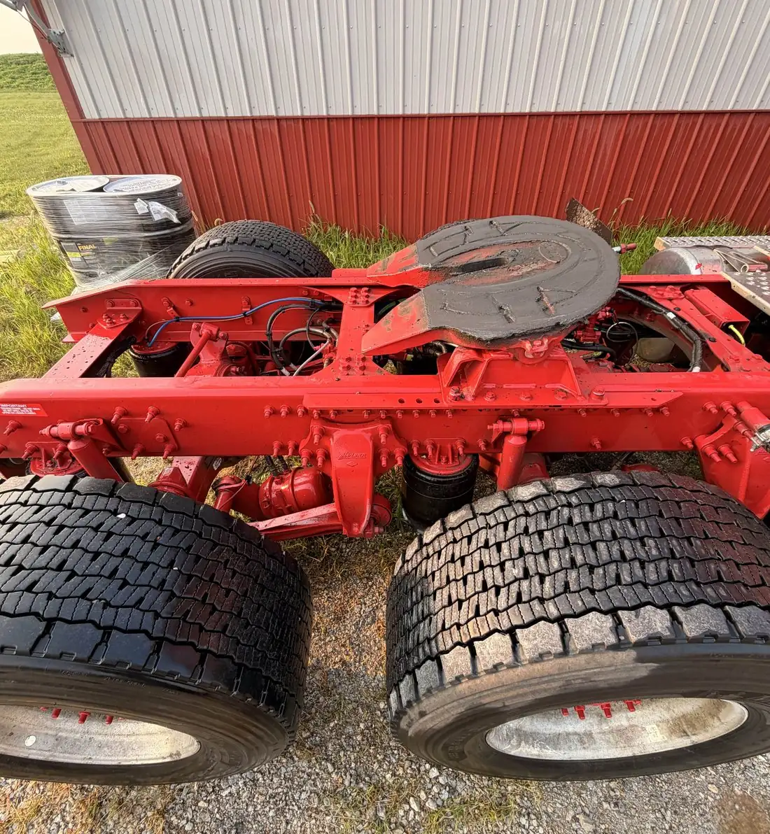 Peterbilt frame and fifth wheel freshly degreased and painted red