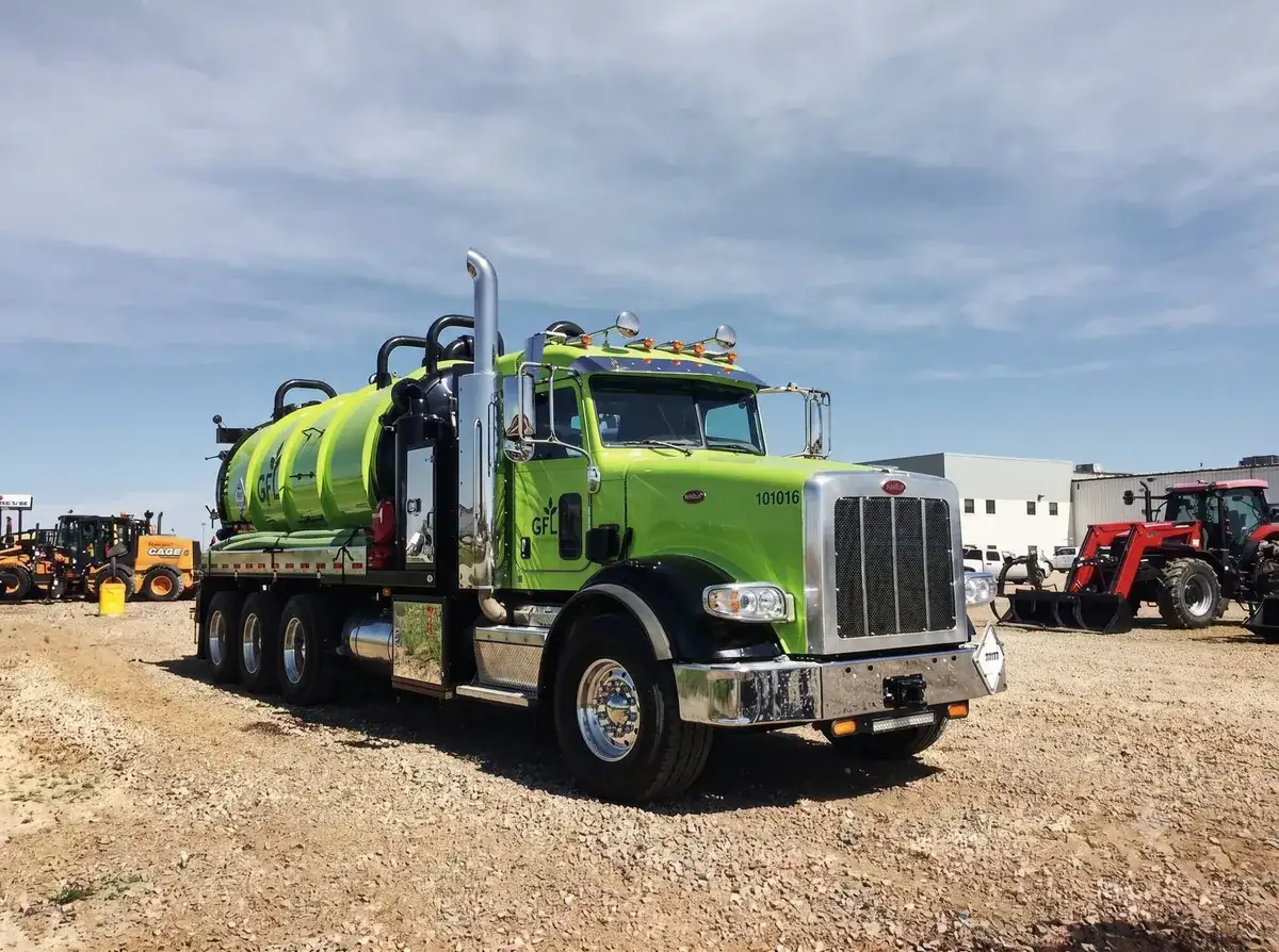 Vacuum truck washed on-site with runoff containment
